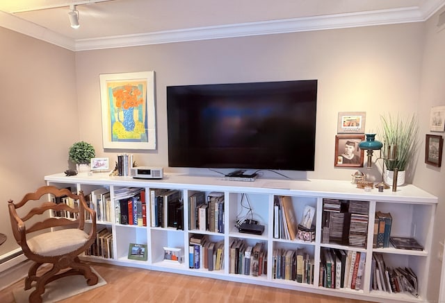 12 Heritage Crst Unit E, Southbury, CT 06488 - living area featuring ornamental molding, wood finished floors, and rail lighting