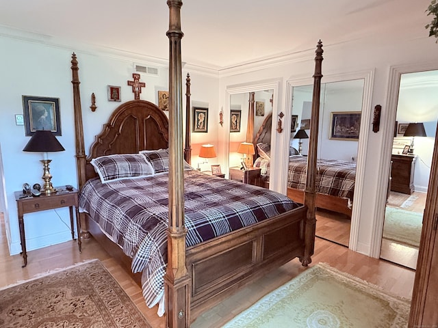 12 Heritage Crst Unit E, Southbury, CT 06488 - bedroom with wood finished floors and ornamental molding