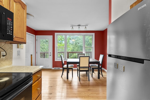 23 Rockmeadow Rd, Norwalk, CT 06850 - dining space featuring light wood finished floors