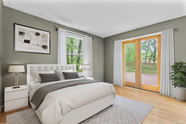 23 Rockmeadow Rd, Norwalk, CT 06850 - bedroom with access to outside and wood finished floors