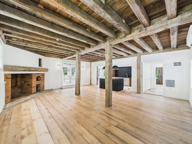153 Valley Forge Rd, Weston, CT 06883 - below grade area featuring a fireplace, wood-type flooring, wooden ceiling, and baseboards