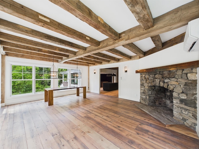 153 Valley Forge Rd, Weston, CT 06883 - unfurnished living room with healthy amount of natural light, hardwood / wood-style flooring, beam ceiling, a chandelier, and a fireplace