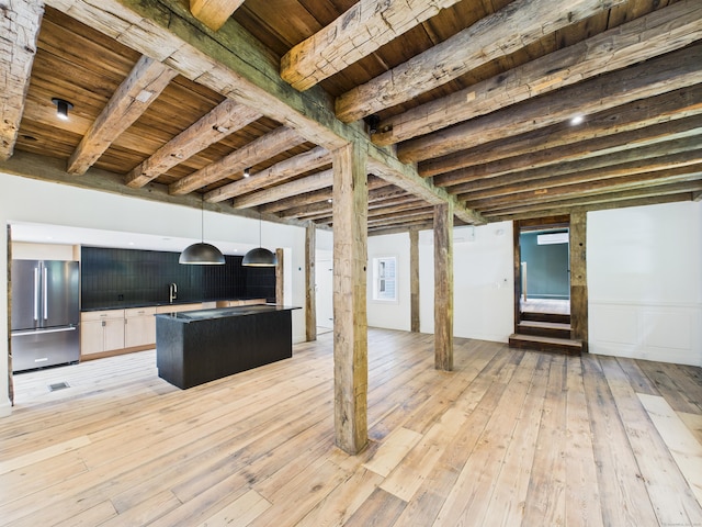 153 Valley Forge Rd, Weston, CT 06883 - kitchen with high end fridge, wood ceiling with exposed beams, a sink, a center island, and light wood-style floors