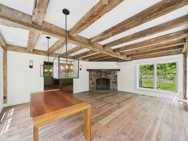 153 Valley Forge Rd, Weston, CT 06883 - unfurnished living room featuring a wall unit AC, wood-type flooring, beam ceiling, baseboards, and a chandelier