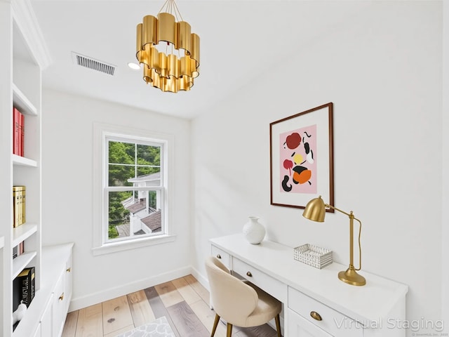 153 Valley Forge Rd, Weston, CT 06883 - office area with light wood finished floors, a chandelier, baseboards, and built in study area