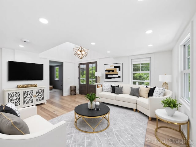 153 Valley Forge Rd, Weston, CT 06883 - living area featuring wood finished floors, recessed lighting, and french doors