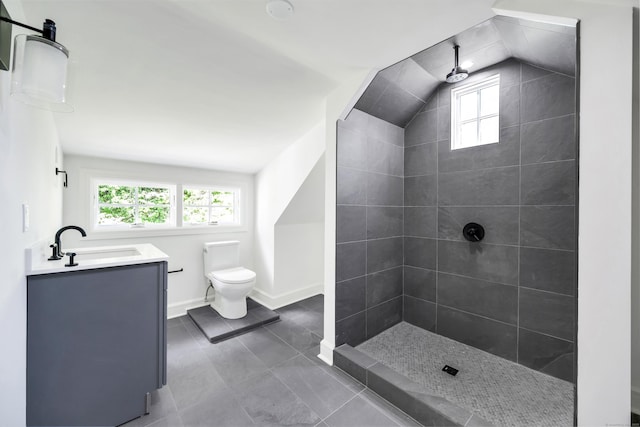 153 Valley Forge Rd, Weston, CT 06883 - full bathroom with healthy amount of natural light, toilet, tiled shower, vanity, and lofted ceiling
