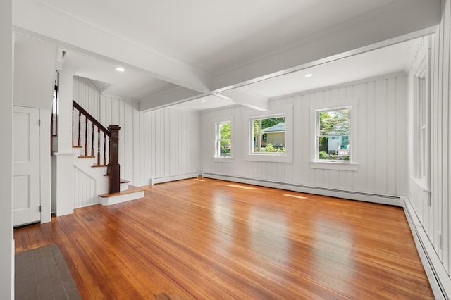 46 Park St, New London, CT 06320 - unfurnished living room featuring wood-type flooring, a baseboard radiator, a baseboard heating unit, beam ceiling, and stairway