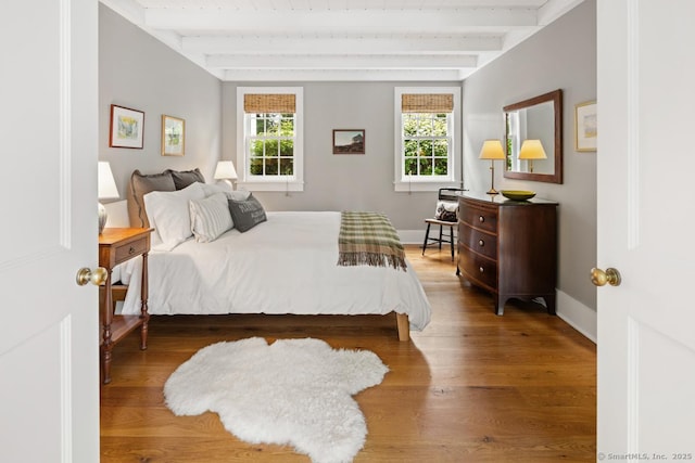 108 Clapboard Hill Rd, Westport, CT 06880 - bedroom with beam ceiling and wood finished floors