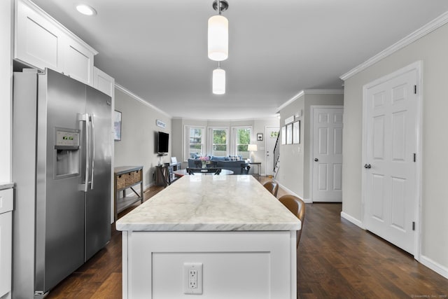 92 Lafayette St Apt 5, Stamford, CT 06902 - kitchen with stainless steel fridge with ice dispenser, a kitchen island, ornamental molding, white cabinets, and open floor plan