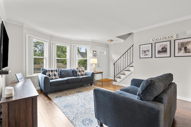 92 Lafayette St Apt 5, Stamford, CT 06902 - living room featuring stairs, ornamental molding, and wood finished floors