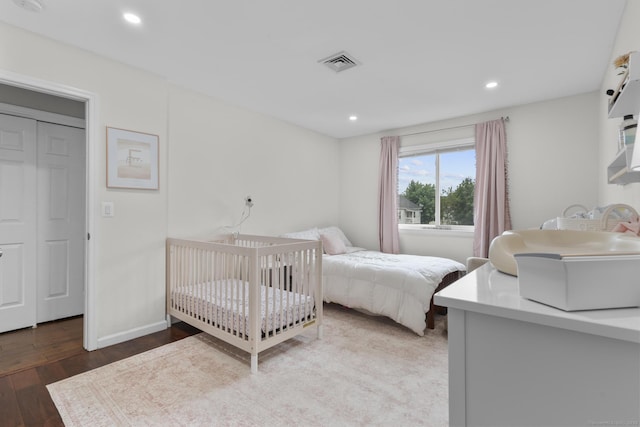 92 Lafayette St Apt 5, Stamford, CT 06902 - bedroom with wood finished floors and recessed lighting