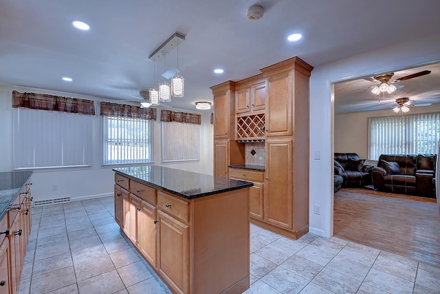 673 May St, Naugatuck, CT 06770 - kitchen with ceiling fan, light tile patterned floors, healthy amount of natural light, and recessed lighting