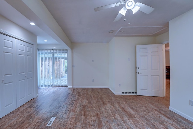 673 May St, Naugatuck, CT 06770 - spare room with attic access, wood finished floors, a ceiling fan, recessed lighting, and a smoke detector