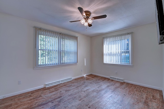 673 May St, Naugatuck, CT 06770 - unfurnished room featuring ceiling fan, wood finished floors, and a textured ceiling