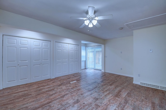 673 May St, Naugatuck, CT 06770 - unfurnished bedroom with attic access, wood finished floors, two closets, and ceiling fan