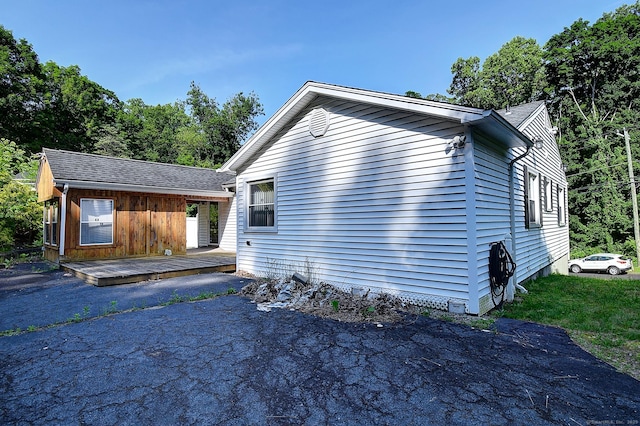 673 May St, Naugatuck, CT 06770 - view of side of property with a wooden deck