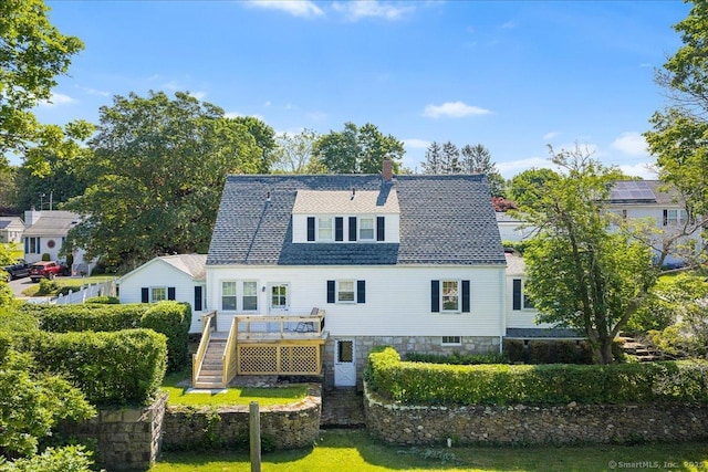 17 Wild Rose Pl, Waterford, CT 06385 - back of property with a deck, stairway, a chimney, and a shingled roof