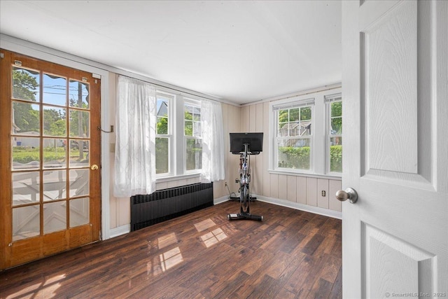 17 Wild Rose Pl, Waterford, CT 06385 - exercise room with radiator heating unit, wood finished floors, and baseboards