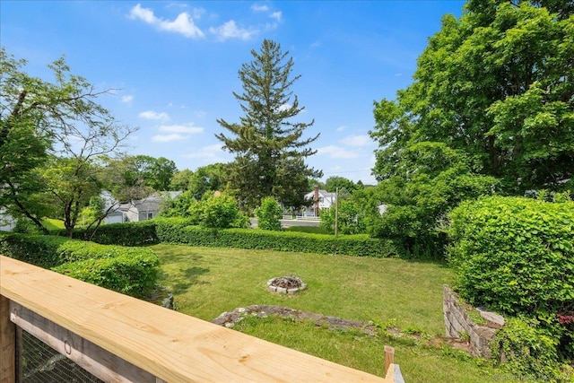 17 Wild Rose Pl, Waterford, CT 06385 - view of green lawn featuring a fire pit