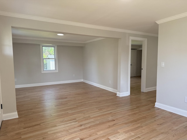 42 Waldo St, East Haven, CT 06512 - spare room featuring light wood-style floors, baseboards, and ornamental molding