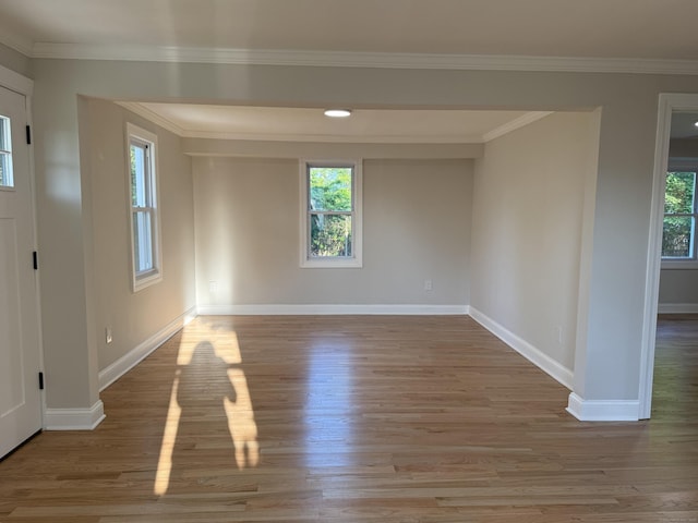 42 Waldo St, East Haven, CT 06512 - unfurnished room with wood finished floors, baseboards, and crown molding