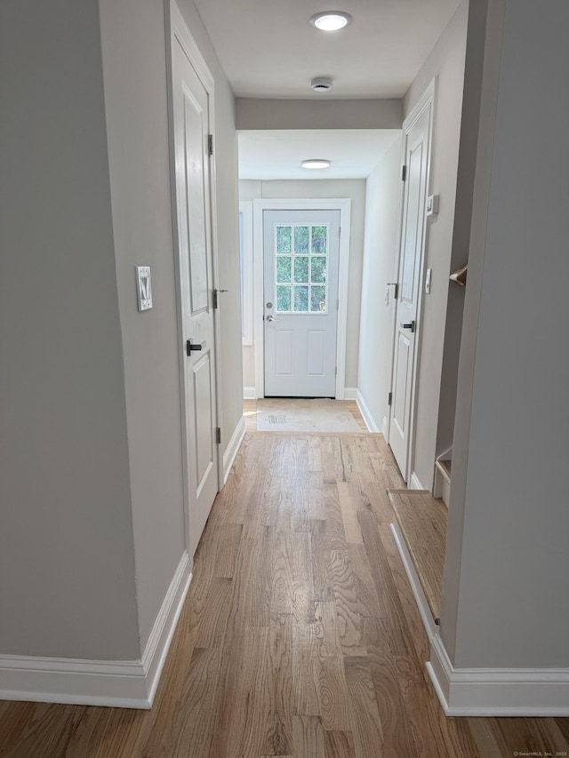 42 Waldo St, East Haven, CT 06512 - hallway with light wood-style flooring and baseboards