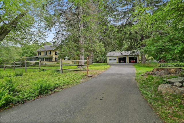 12 Lords Hwy E, Weston, CT 06883 - view of front of property with a detached garage
