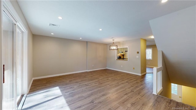 12 Cardinal Dr Unit 12, Farmington, CT 06032 - unfurnished room featuring wood finished floors, healthy amount of natural light, recessed lighting, and baseboards