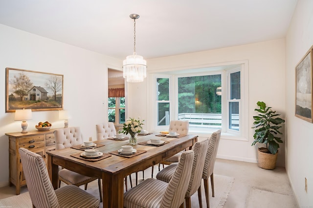 35 Chestnut Hill Rd, Simsbury, CT 06092 - dining space with a chandelier and baseboards