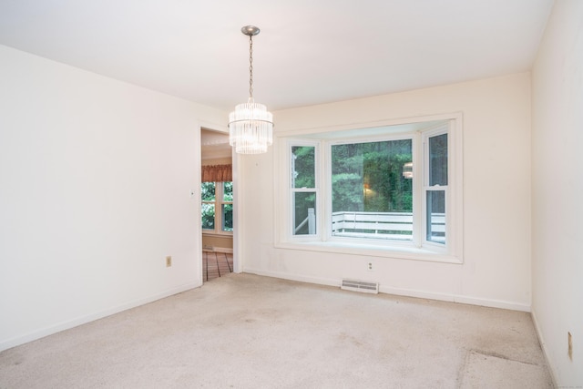 35 Chestnut Hill Rd, Simsbury, CT 06092 - carpeted spare room with a chandelier and baseboards