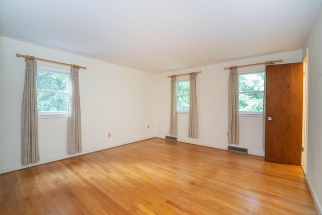 35 Chestnut Hill Rd, Simsbury, CT 06092 - unfurnished room featuring plenty of natural light and light wood-style flooring