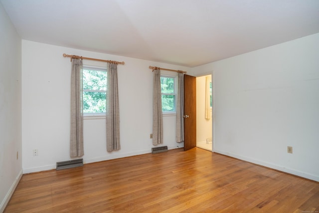 35 Chestnut Hill Rd, Simsbury, CT 06092 - empty room with light wood-style flooring and baseboards