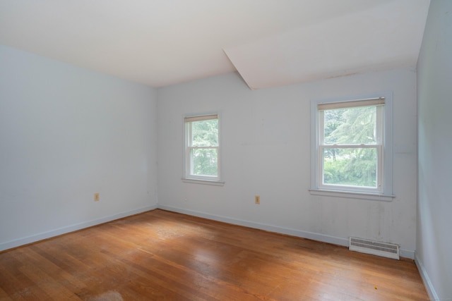 35 Chestnut Hill Rd, Simsbury, CT 06092 - empty room with light wood finished floors and baseboards