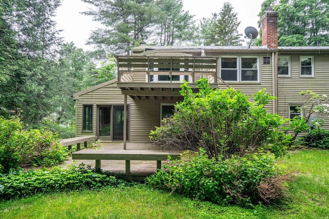 35 Chestnut Hill Rd, Simsbury, CT 06092 - rear view of property with a deck and a chimney