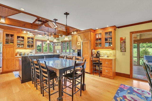 45 Snell Rd, Middlefield, CT 06422 - dining area featuring light wood-style floors, recessed lighting, and crown molding