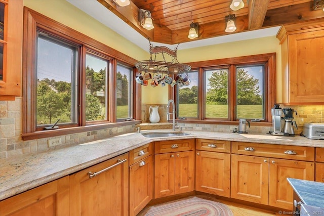 45 Snell Rd, Middlefield, CT 06422 - kitchen with wooden ceiling, healthy amount of natural light, decorative backsplash, and light stone counters