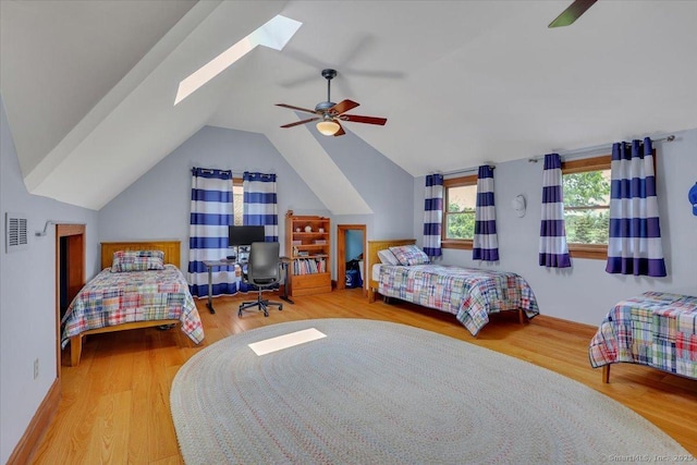 45 Snell Rd, Middlefield, CT 06422 - bedroom featuring wood finished floors, lofted ceiling, an office area, a skylight, and a ceiling fan