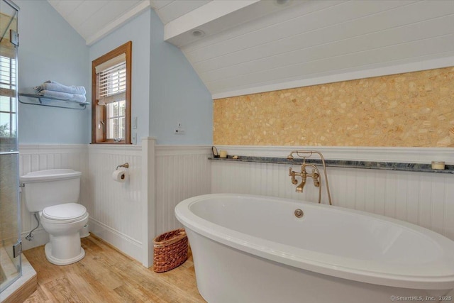 45 Snell Rd, Middlefield, CT 06422 - bathroom featuring vaulted ceiling, a wainscoted wall, a freestanding bath, and wood finished floors
