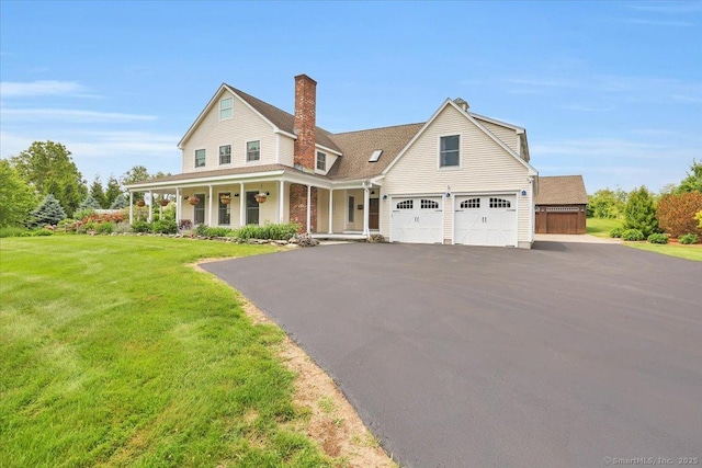 45 Snell Rd, Middlefield, CT 06422 - view of front of property featuring covered porch, asphalt driveway, a front yard, and a chimney