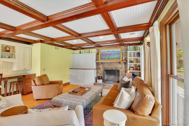 45 Snell Rd, Middlefield, CT 06422 - living area featuring light wood-type flooring, coffered ceiling, beamed ceiling, and a fireplace