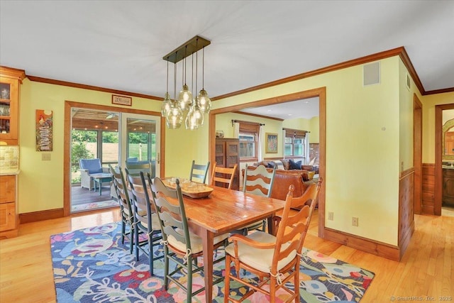 45 Snell Rd, Middlefield, CT 06422 - dining area with ornamental molding, light wood-style flooring, and a chandelier