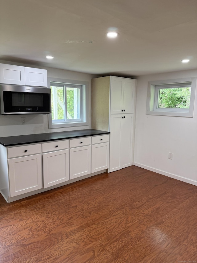 116 Howd Rd, Durham, CT 06422 - kitchen with stainless steel microwave, dark wood-type flooring, dark countertops, recessed lighting, and healthy amount of natural light