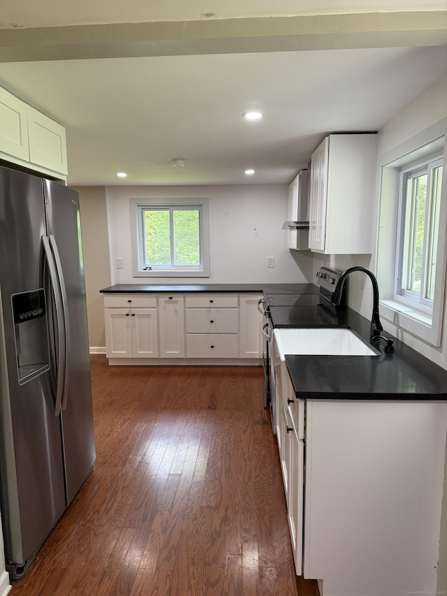 116 Howd Rd, Durham, CT 06422 - kitchen featuring stainless steel fridge, black range with electric cooktop, dark countertops, white cabinets, and recessed lighting