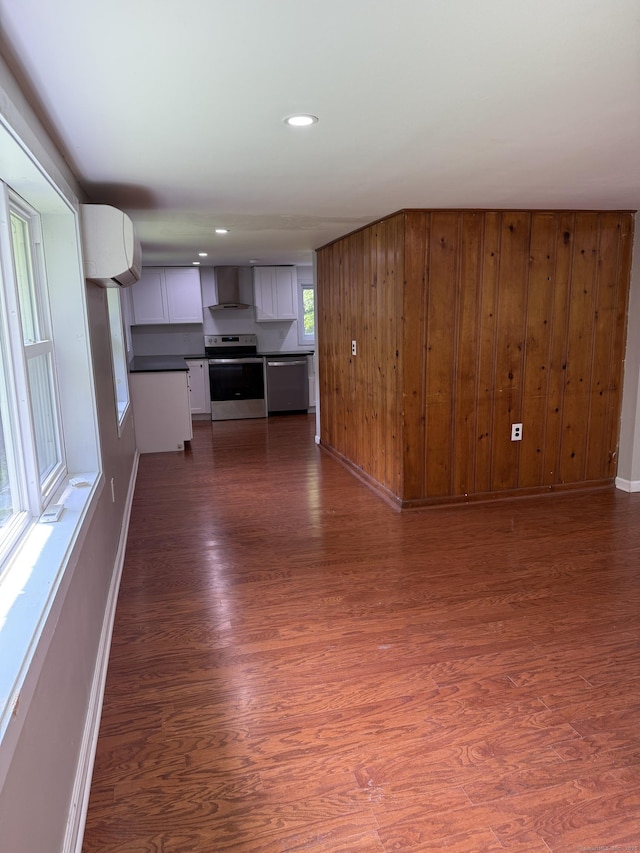 116 Howd Rd, Durham, CT 06422 - unfurnished living room with dark wood finished floors, recessed lighting, and an AC wall unit