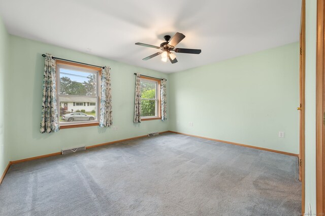 42 Cindy Ln, Groton, CT 06355 - spare room with carpet and a ceiling fan