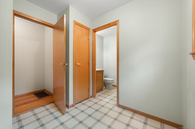 42 Cindy Ln, Groton, CT 06355 - hallway featuring baseboards and light flooring