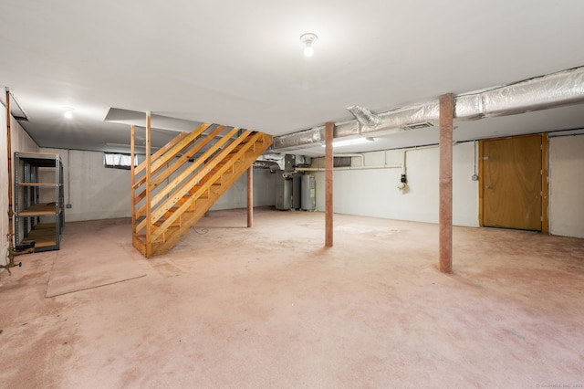 42 Cindy Ln, Groton, CT 06355 - finished basement featuring water heater and stairs