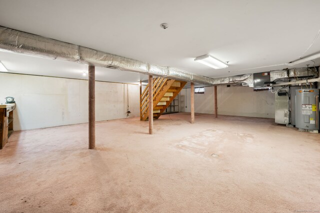 42 Cindy Ln, Groton, CT 06355 - unfinished basement with water heater, stairway, and heating unit