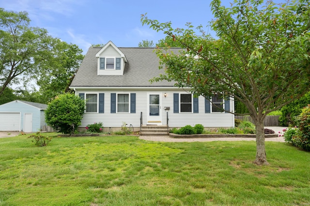 42 Cindy Ln, Groton, CT 06355 - new england style home featuring a garage, an outdoor structure, and roof with shingles